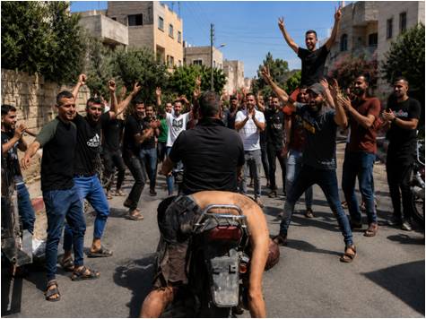 Crowd gathered in a street